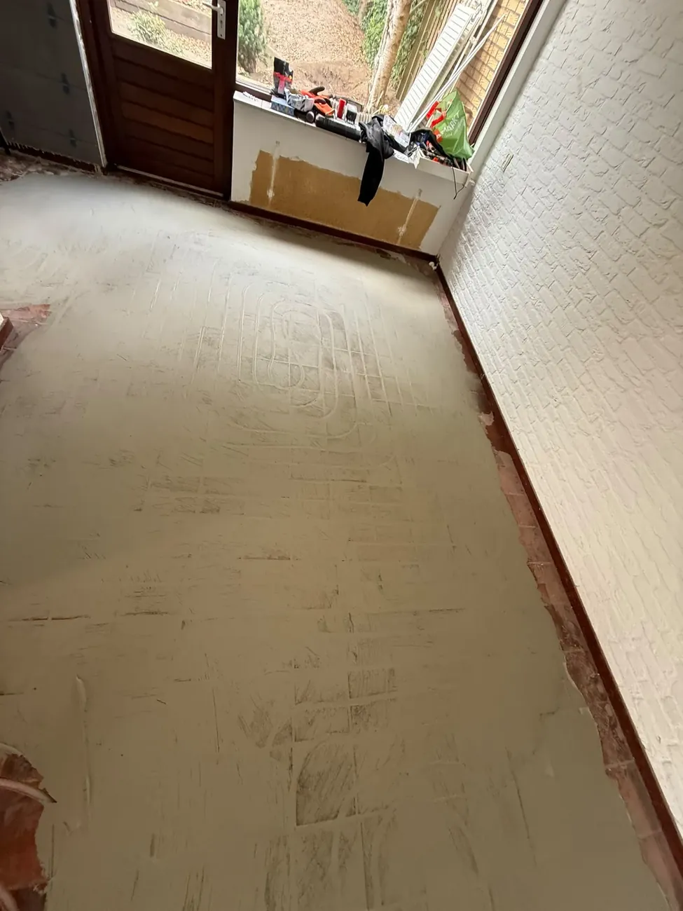 Vlak afgewerkte vloer na renovatie